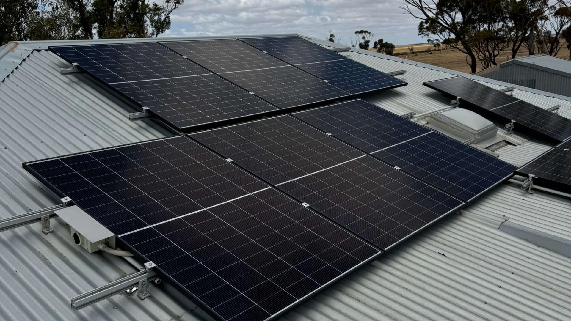 Solar panels on roof of rural house